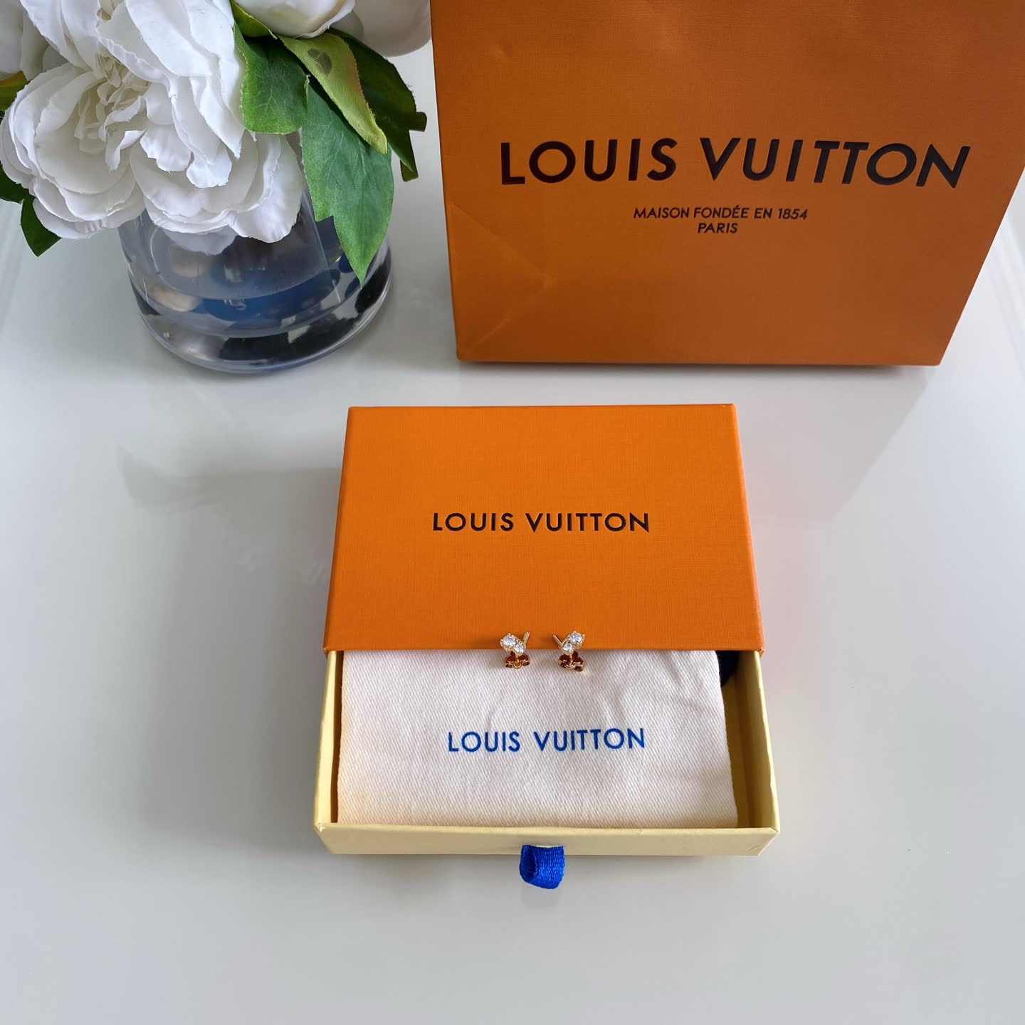 Louis Vuitton Gold Tone Stud Earrings with Clear Stones